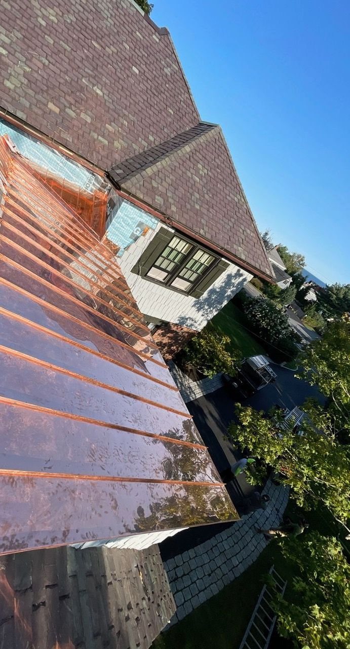 Aerial view of newly installed standing-seam copper roof