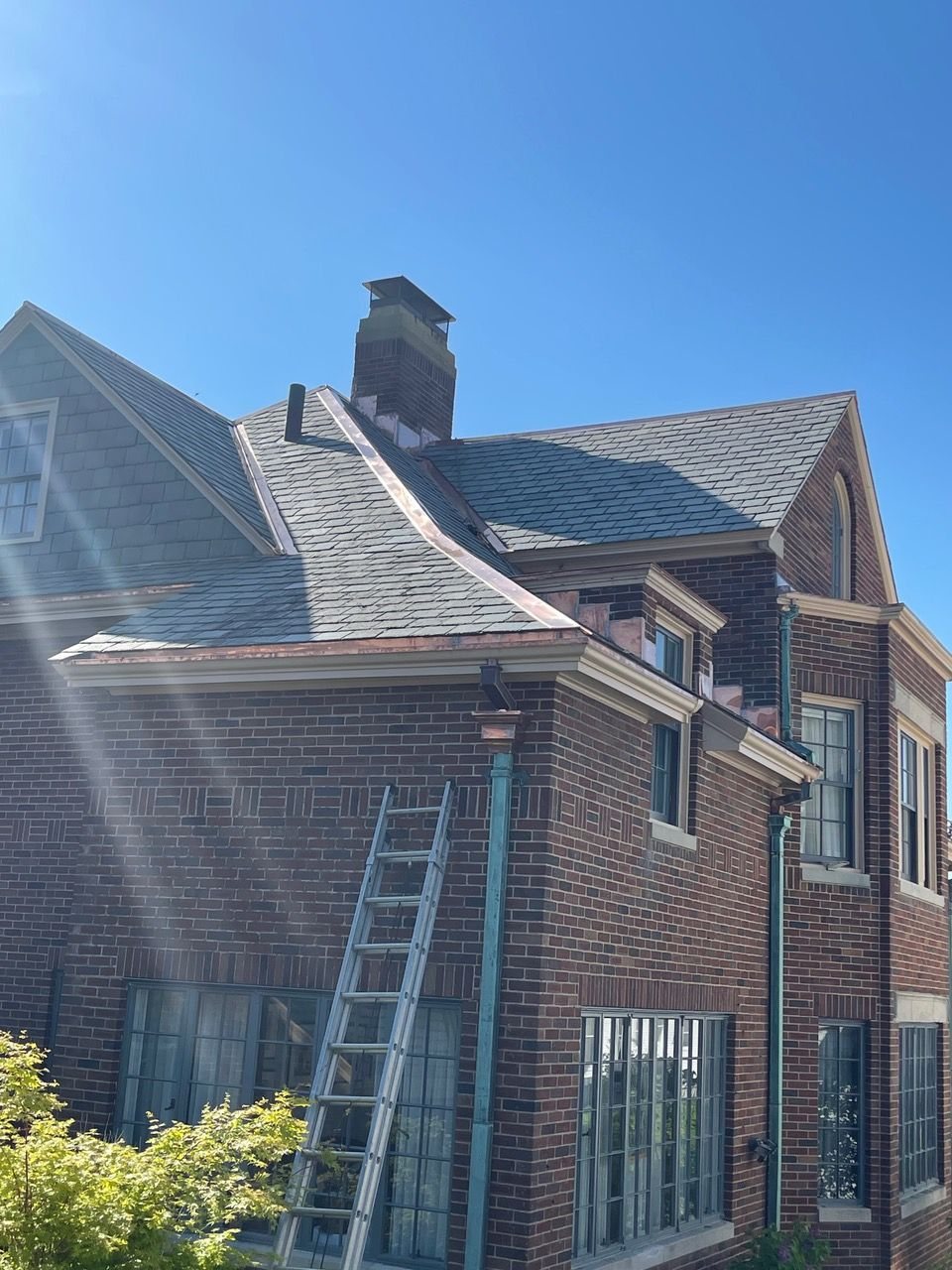 Slate re-roof on early-1900s brick Boston home