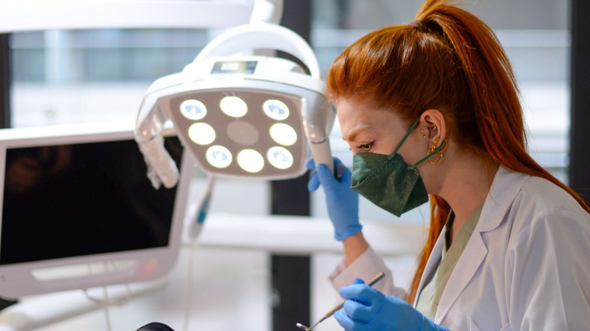 A dentist examining a patient in a modern dental clinic